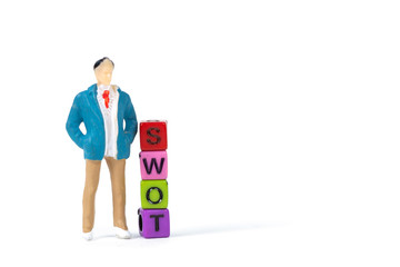 Businessman or manager with SWOT text made from colorful beads or letter bead on white background, finance and business concept.
