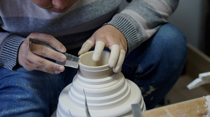 A close-up shot of making handmade ceramic products