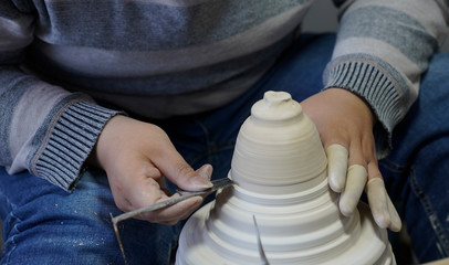 A close-up shot of making handmade ceramic products