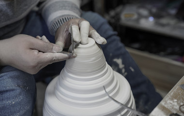 A close-up shot of making handmade ceramic products