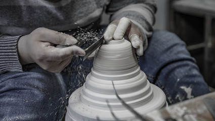 A close-up shot of making handmade ceramic products