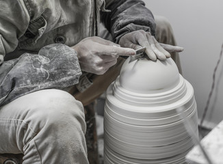 A close-up shot of making handmade ceramic products