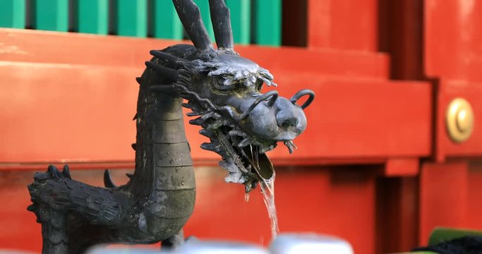 Purification trough at Kanda shrine in Tokyo closeup