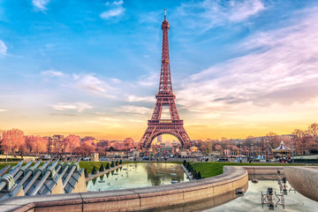 Fototapeta na wymiar Eiffel Tower at sunset in Paris, France. Romantic travel background