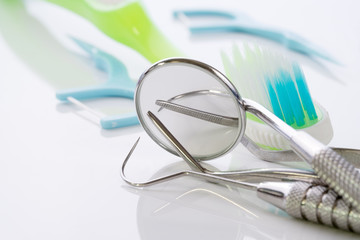 Close up / dental tools use for dentist on the white background.