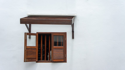old window with wooden shutters