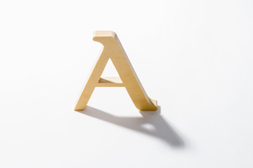 Wooden Alphabet A and Shadow Reflection.