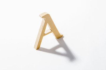 Wooden Alphabet A and Shadow Reflection.