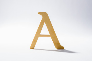 Wooden Alphabet A and Shadow Reflection.