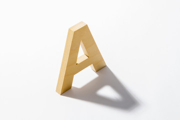 Wooden Alphabet A and Shadow Reflection.