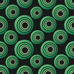 Seamless background of concentric circles in neon green colors on black