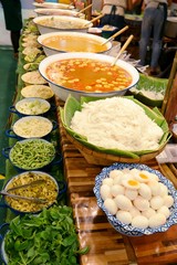 kanom jeen nam ya, noodles with fish curry sauce,thailand street food