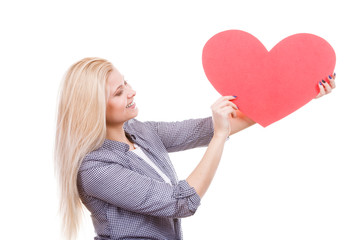 Woman holding big red heart, love sign