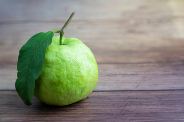 guava fruit on wooden background.guava fruit top view on wooden background