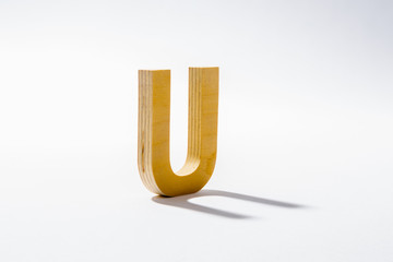 Wooden Alphabet U and Shadow Reflection. © JOE