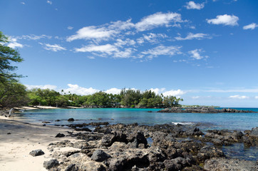 Gorgeous clouds reflecting in waters of Waialea  beach