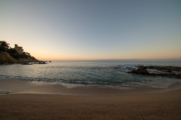 Sunrise on the beach of Lloret de Mar