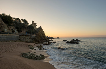 Sunrise on the beach of Lloret de Mar