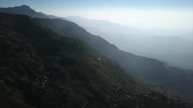 Aerial view of the green mountains and hills near the town of Haputale in Sri Lanka