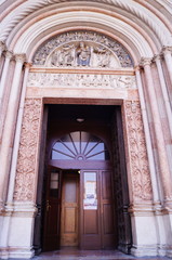 Entrance door of the baptistery of Parma, Italy
