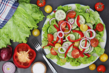 A plate full of bright fresh vegetable salad