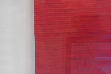 Fototapeta na wymiar Red mesh on gray background