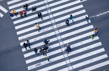 People walking Crossing street Sign Top view Crosswalk in city Business area © VTT Studio
