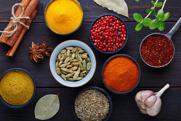 Wooden table of colorful spices