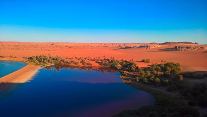 Sunset aerial Panoramic view to Yoa lake group of Ounianga kebir lakes at the Ennedi, Chad