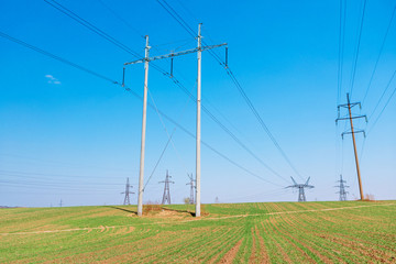 Fototapeta na wymiar Electricity pylons and power lines