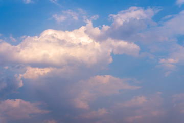 Blue sky background and white clouds soft focus, and copy space