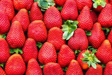 red strawberries pattern in market, fresh strawberries texture, fruit