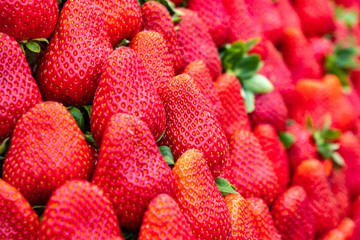 red strawberries pattern in market, fresh strawberries texture, fruit