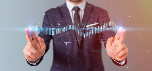 Businessman holding a Business stock exchange trading data information