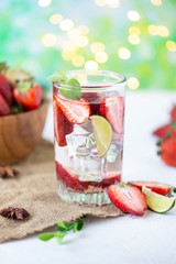 healthy refreshing energy ice cold strawberries lemonade with lime