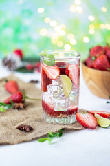 healthy refreshing energy ice cold strawberries lemonade with lime