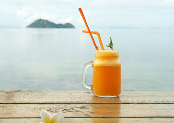 Summer cocktail with various tropical fruits