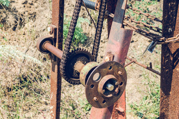 Old rusty sea winch on the shore