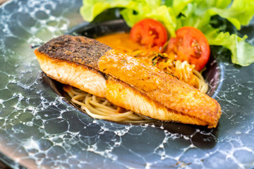 spaghetti with fried salmon