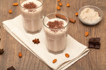 Healthy chocolate protein shake with almond milk. Delicious Healthy breakfast or snack. Selective focus