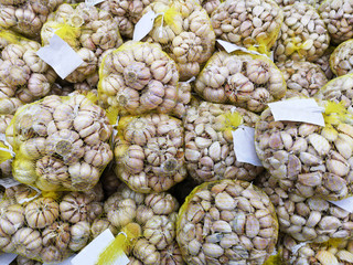 top view of garlic for sale in the market.