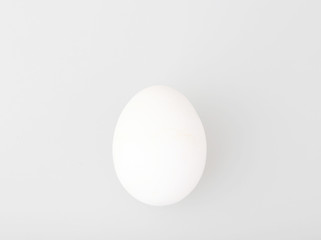 Close-Up Of Egg Over White Background