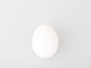 Close-Up Of Egg Over White Background