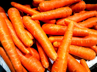 Carrot is an orange color to eat in supermarket
