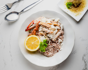 Cooked Steamed red crab on white plate food concept background, top view.
