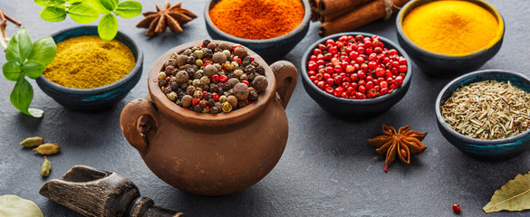 Wooden table of colorful spices.
