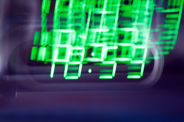 Abstact blurred background with green multiplying numbers