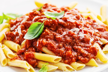 Bolognese penne pasta served on plate