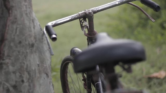 Full HD video with slow pan motion of an old bicycle in Sri Lanka.