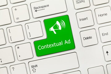 White conceptual keyboard - Contextual Ad (green key)